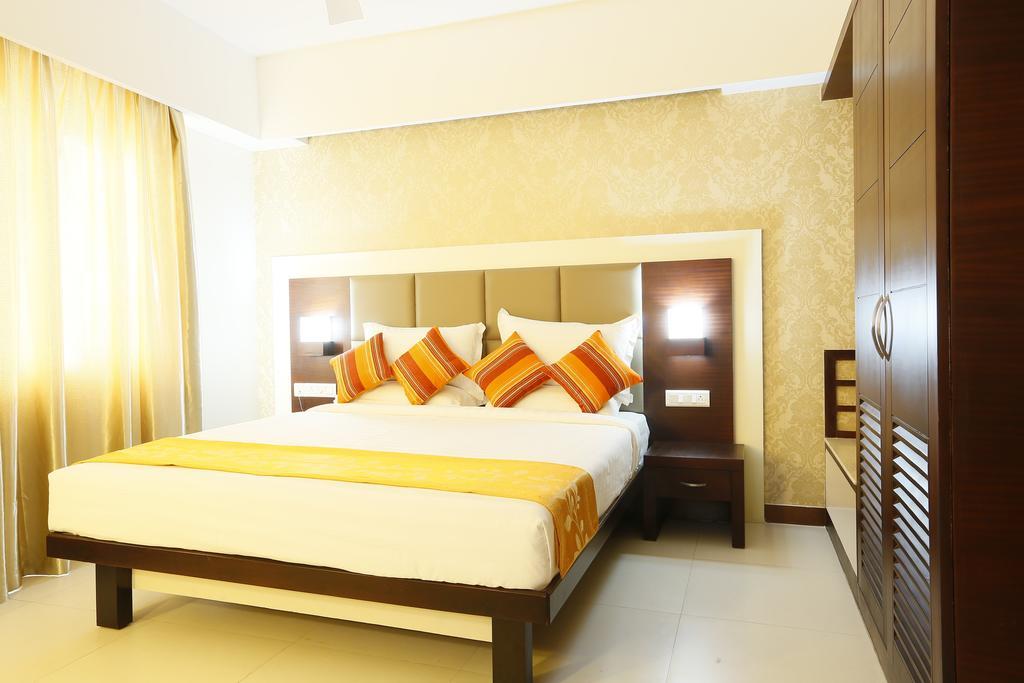 Hotel Moonlit Regency Thodupuzha Quarto foto